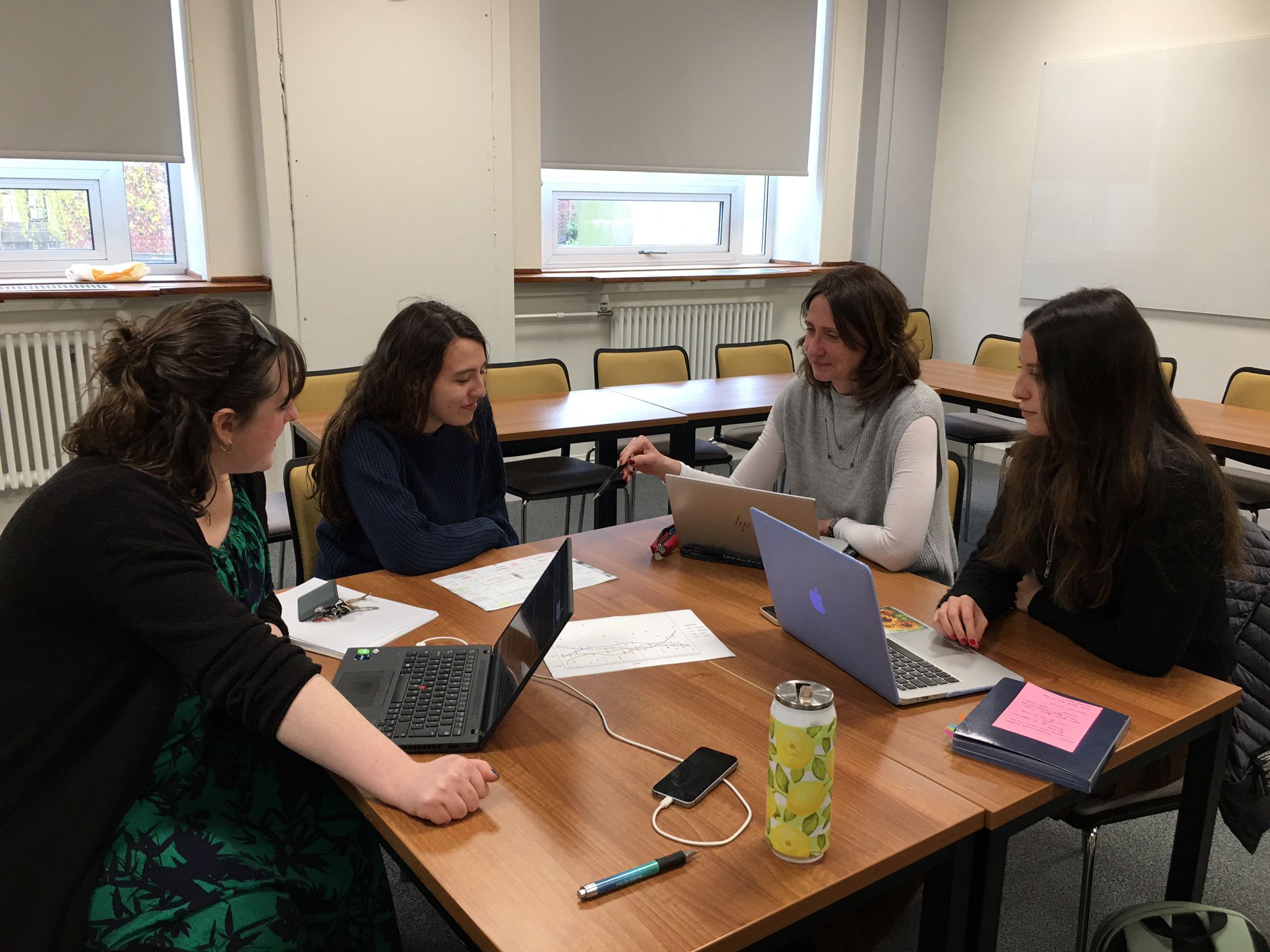Project team members preparing for conference